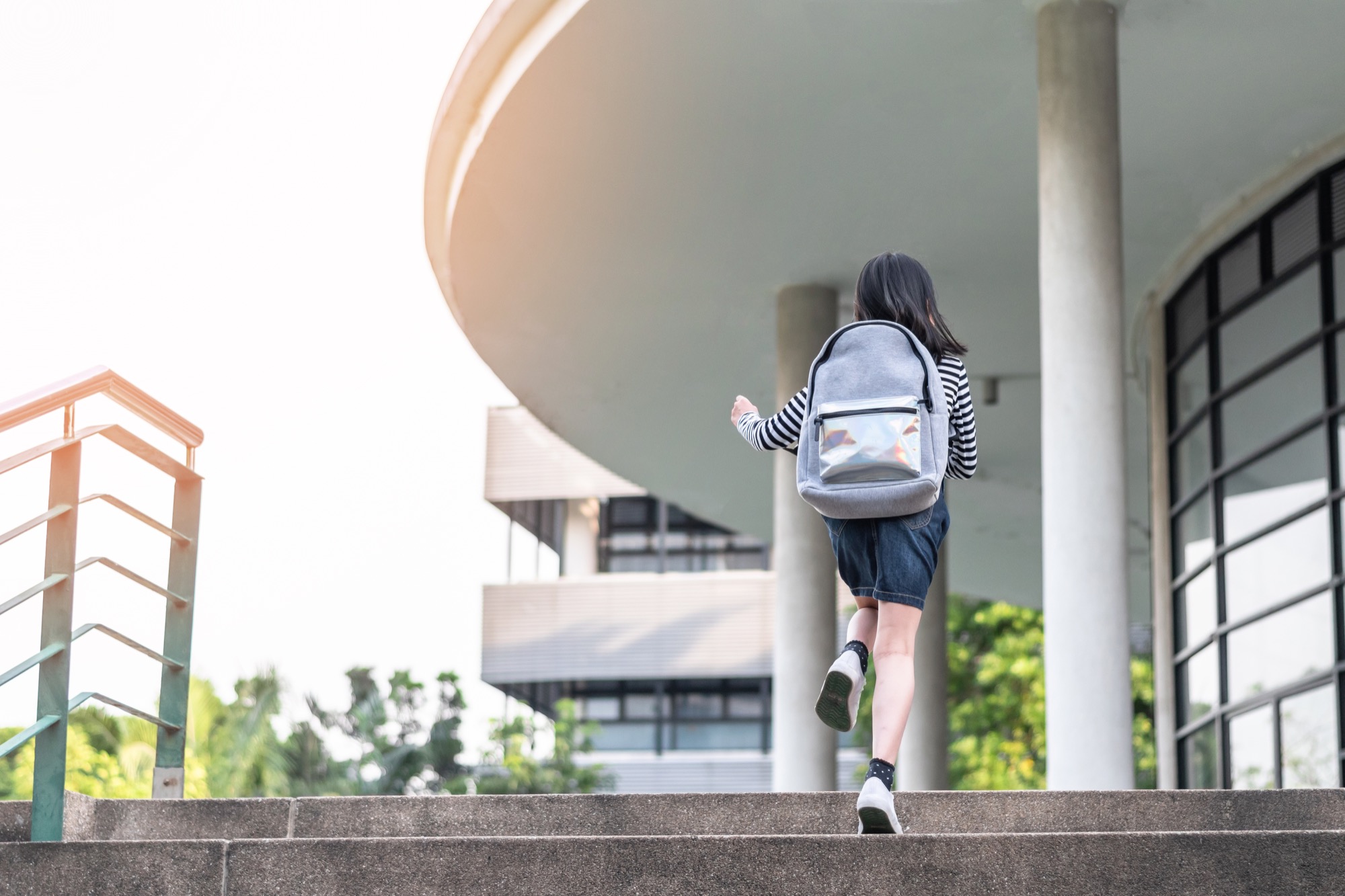 Girl walking through school